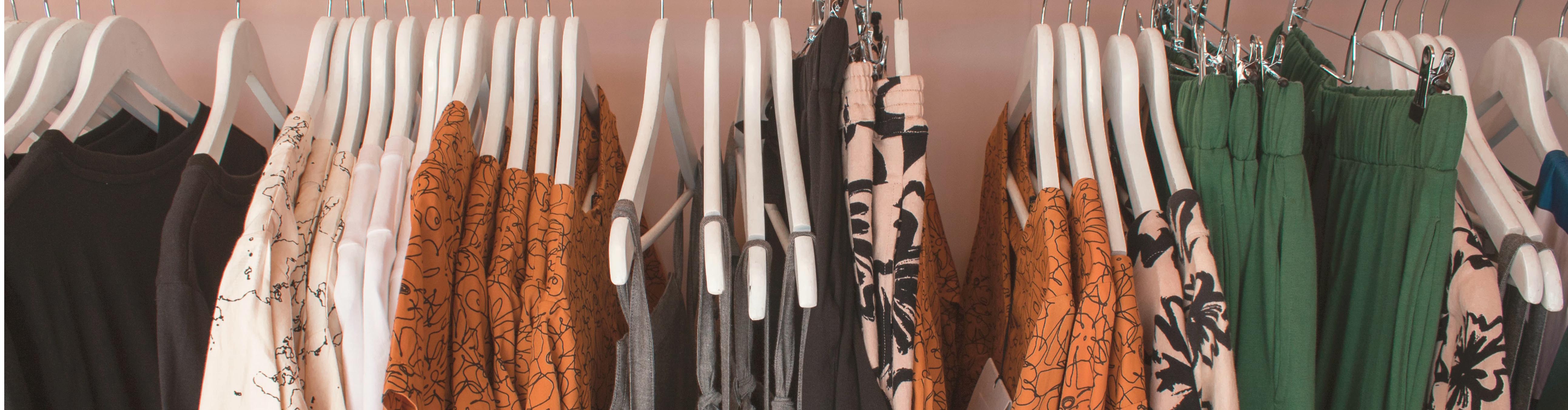 clothing rack starting a small business banner
